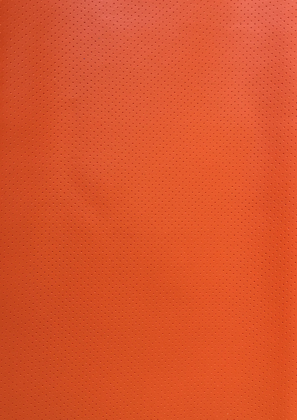orange-perforated-faux-leather-vinyl-55-wide-marine-grade-upholstery-fabric-by-the-yard