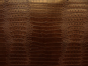 brown-nile-crocodile-embossed-faux-leather-vinyl-55-wide-upholstery-fabric-by-the-yard